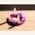 Violetter Geburtstagskranz mit Kerzen